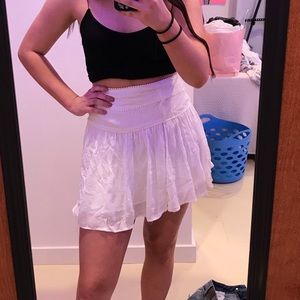 white mini skirt